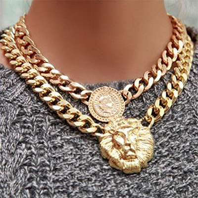 The very trendy gold chocker with a medallion The very trendy gold chocker with a medallion